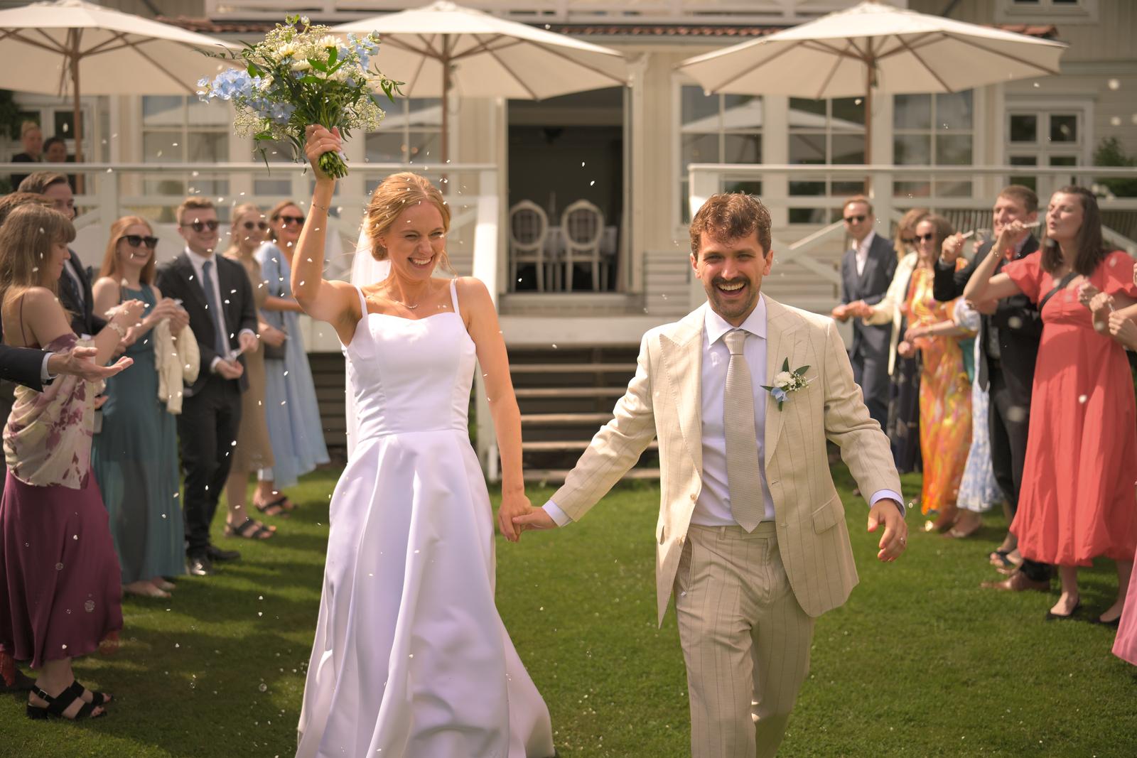 The same photo with the couple in colour and toned-down surroundings