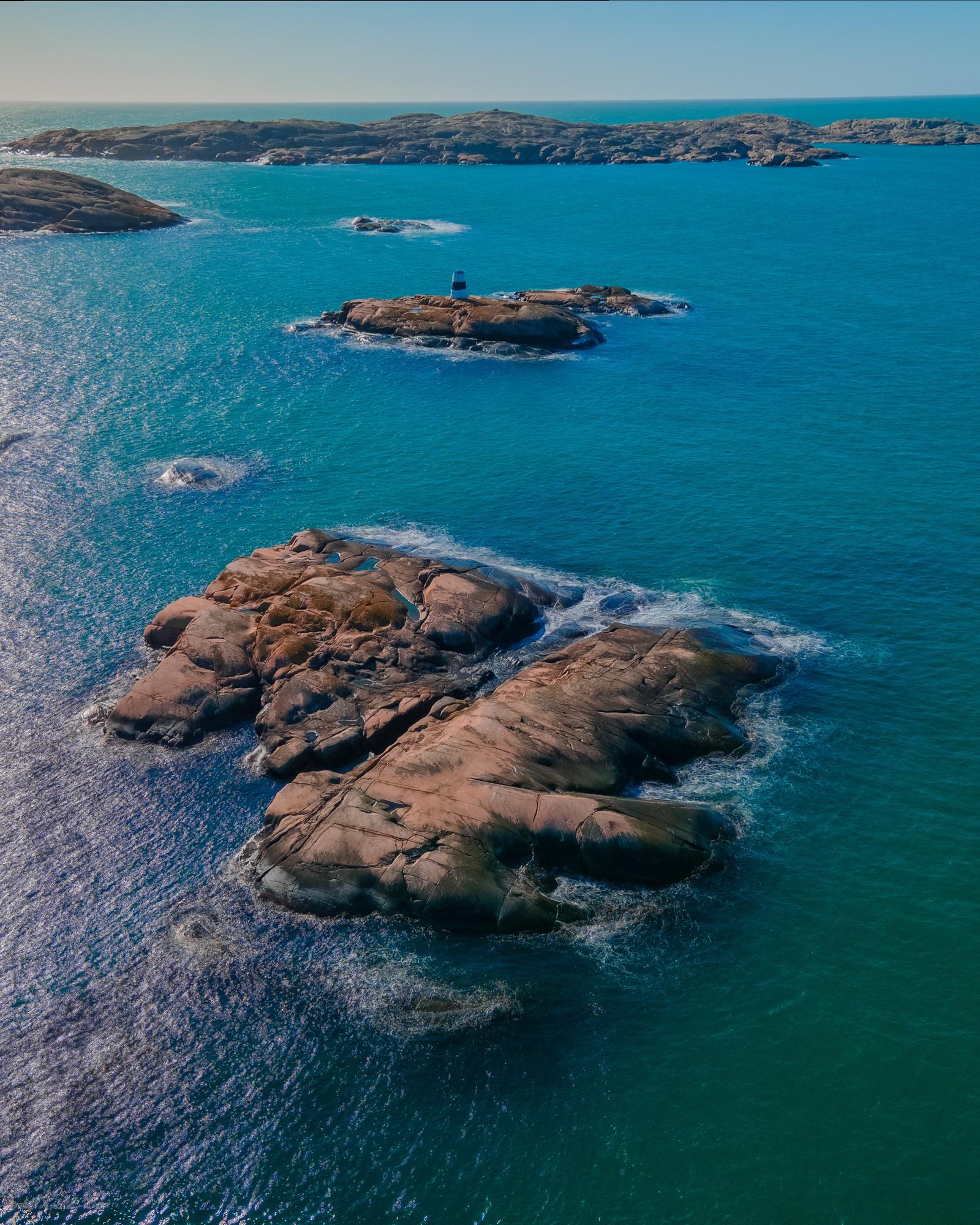 Drone photo of small islands and skerries in the sea in the archipelago